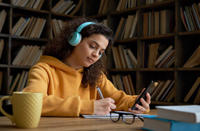 girl doing some mobile learning coursework